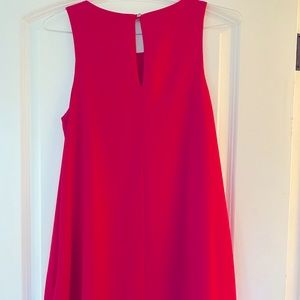 Pink dress with pockets.